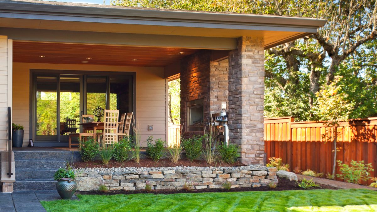 Stunning backyard design with grill and kitchen